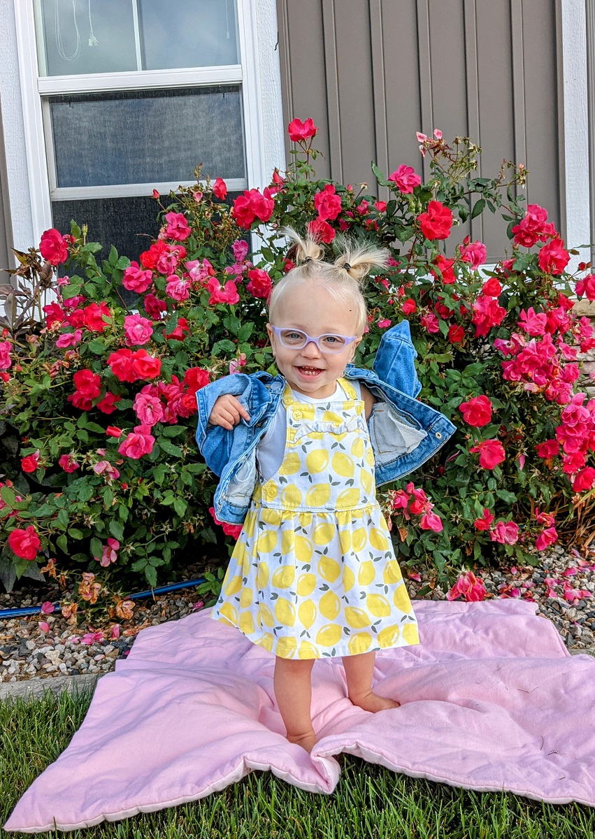 Toddler Dani in flowers