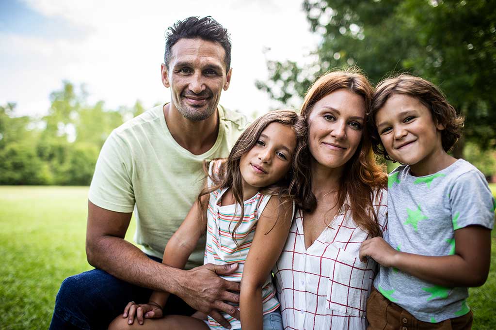 Family of four outside